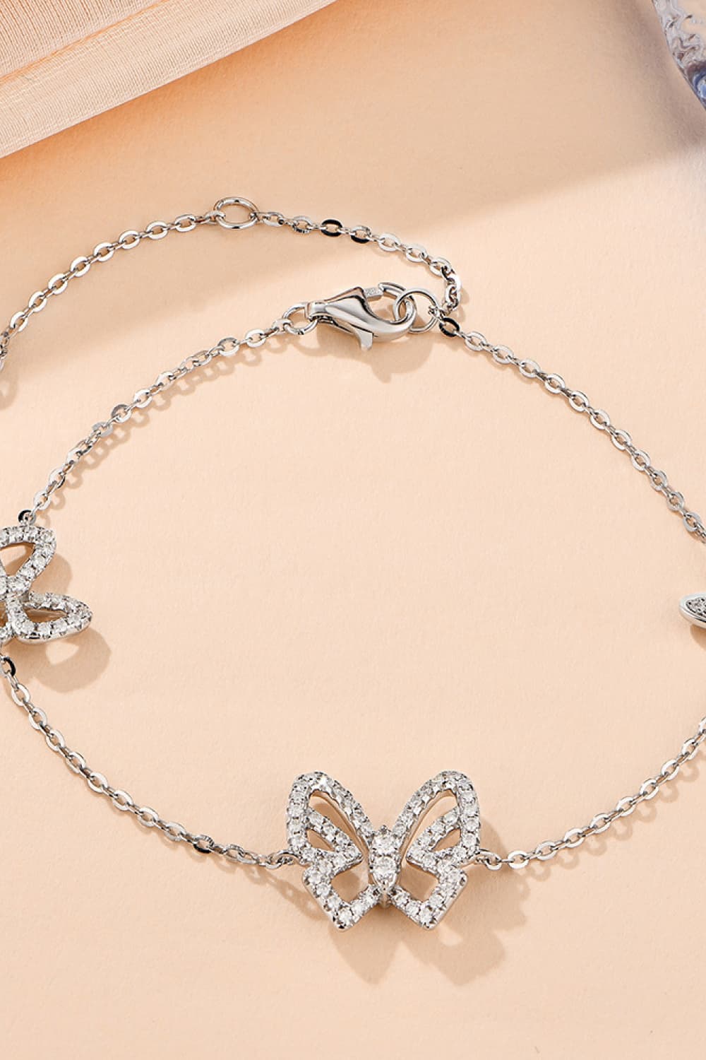 butterfly bracelet sterling silver platinum plated moissanite