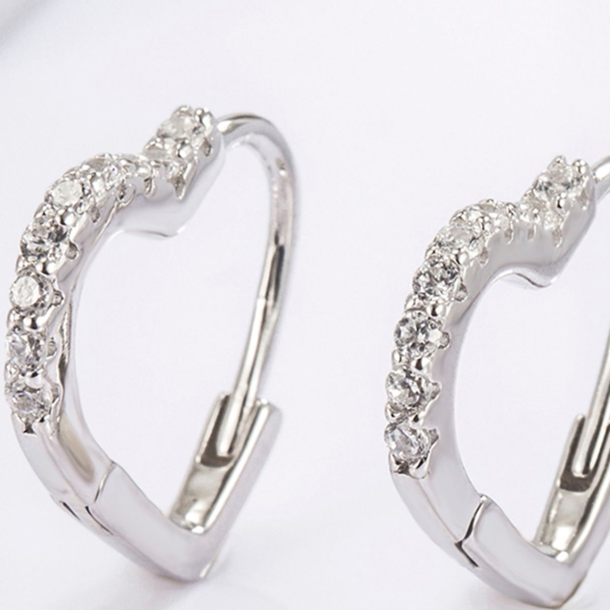 zircon gemstone platinum plated heart shaped earrings