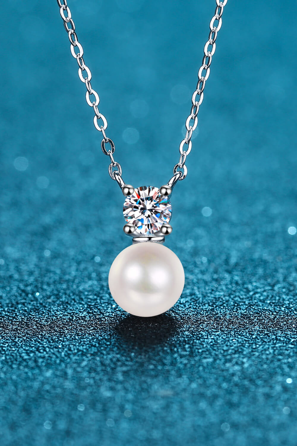 pearl and half carat moissanite silver necklace