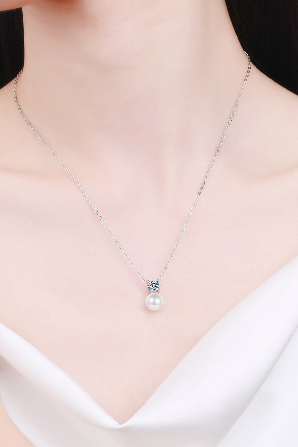 rhodium plated sterling silver pearl and diamond alternative gemstone drop necklace