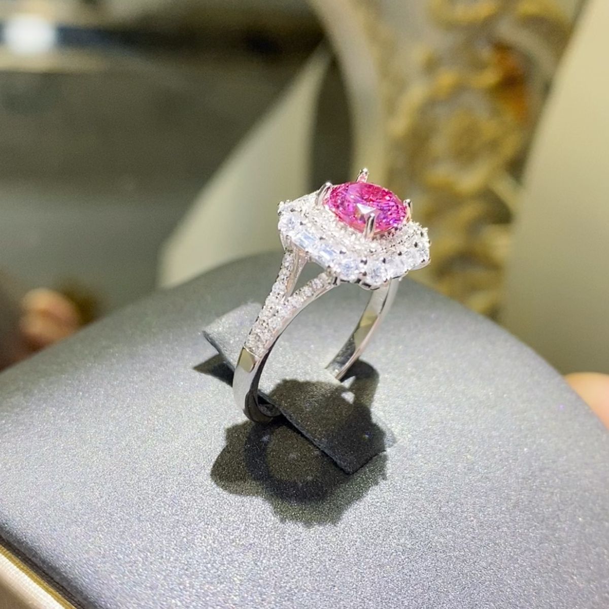 round cut one carat pink moissanite platinum plated halo ring